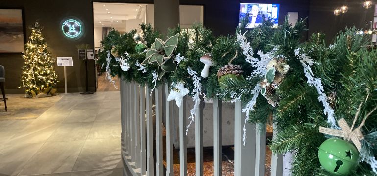 Interior Christmas decorations and Christmas tree inside corporate work environment